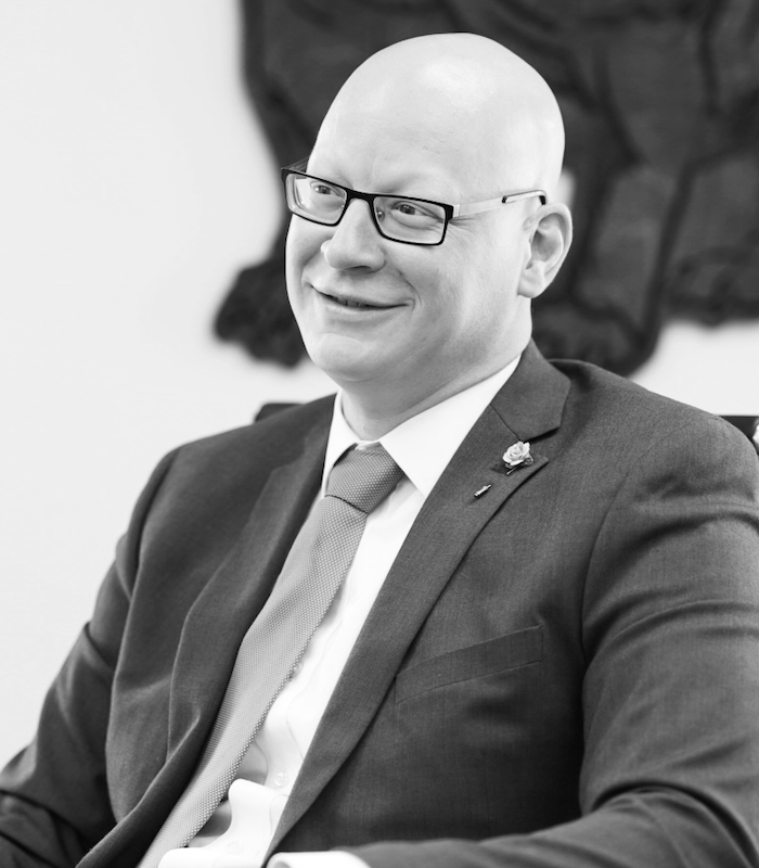 About Our Agency - Alliance Insurance Group Meeting With Clients and Discussing Insurance in the Office